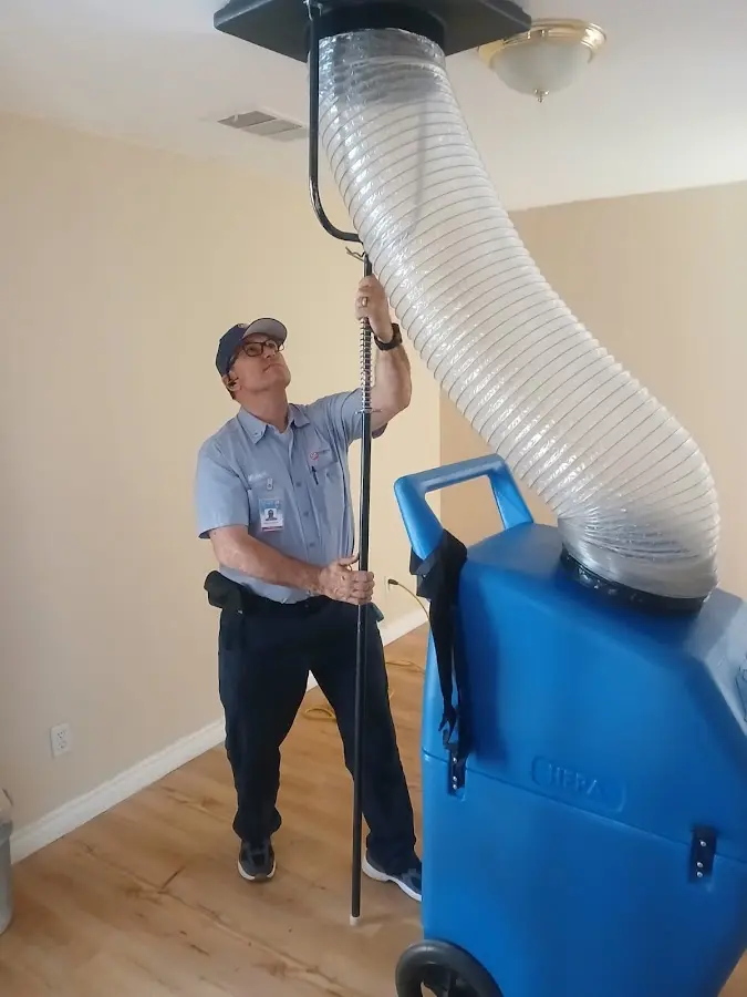 HVAC Installation technician using HEPA equipment in Scio